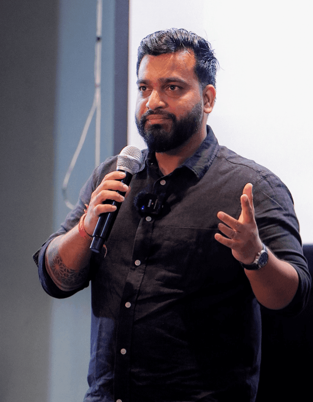 Gourav Gupta, founder of techcadd, speaking to students with a microphone