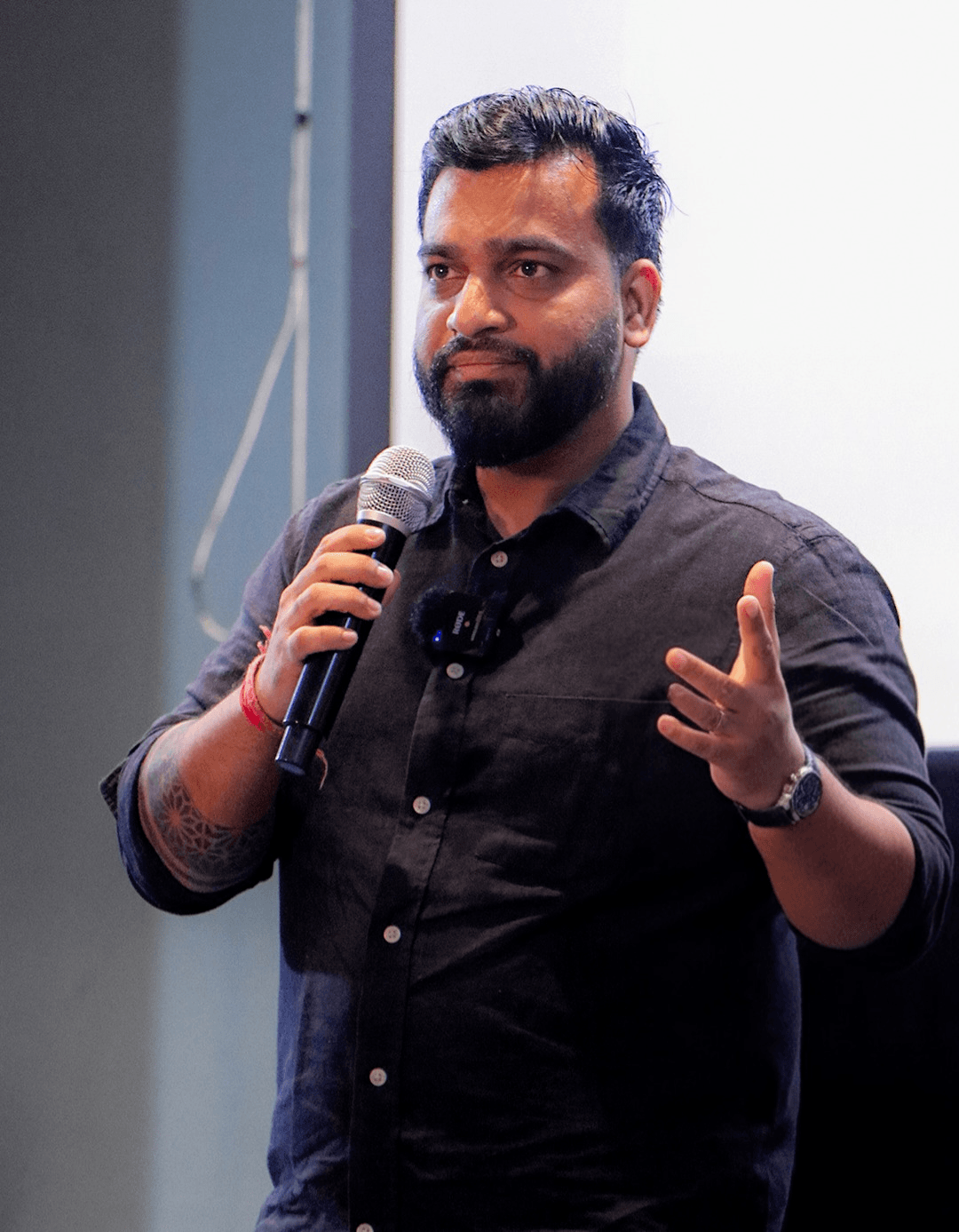 Gourav Gupta, founder of techcadd, speaking to students with a microphone